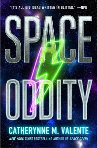 Cover for Space Oddity. On a field of stars, a neon lighting bolt sign, similar to David Bowie's, glows pink and green. The title SPACE ODDITY appears in steel, metal letters.